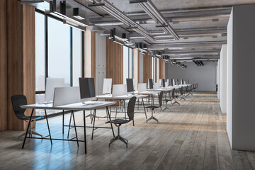 Wall Mural - Perspective view on spacious sunlit coworking office with eco interior design, city view from big windows, wooden floor and wall decoration and cozy work places with modern computers. 3D rendering