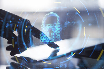 Leinwandbilder - Close up of backlit woman hand pointing at pad at desktop with glowing security padlock on background. Secure, safety and digital protection concept. Double exposure.