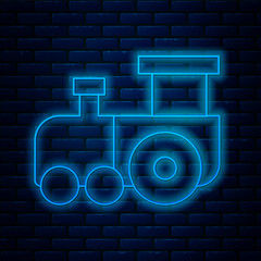 Sticker - Glowing neon line Toy train icon isolated on brick wall background. Vector