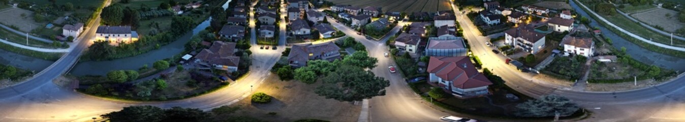 Wall Mural - Tuscany countryside town panoramic aerial view at summer night