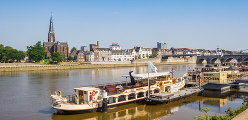 Cruise boats on the Maas river in Maastricht, Netherlands