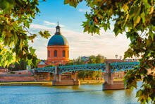 Vibrant Landscape At Sunset Along The Garonne River And La Grave Dome In Toulouse, France