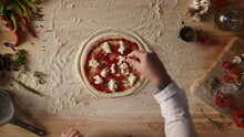 Man Making Homemade Pizza Pepperoni Italian Food Dinner On Kitchen Table Board. 
