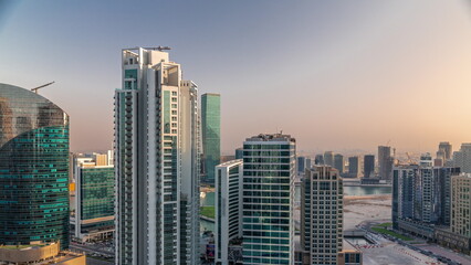  Business Bay Dubai skyscrapers with water canal aerial timelapse.