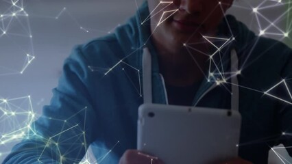 Poster - Animation of biracial male student using tablet over shapes