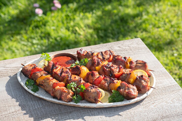 Wall Mural - Grilled pork kebab with red and yellow pepper