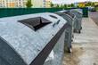 © hiv360 - metal trash cans for separate waste collection in a densely populated area of the city