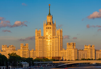 Wall Mural - Kotelnicheskaya Embankment Building (one of seven Stalin skyscrapers) and Moskva river at sunset, Moscow, Russia