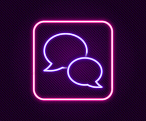 Poster - Glowing neon line Speech bubble chat icon isolated on black background. Message icon. Communication or comment chat symbol. Colorful outline concept. Vector