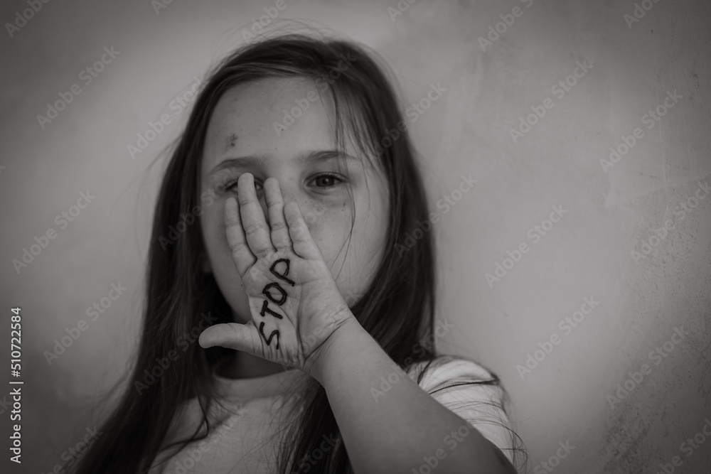 Scared To Fight Black and white portrait of little frightened scared girl raising hand ...