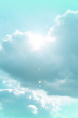  Heaven background. Clouds and sunshine. White clouds and sun rays in a light blue sky.Beautiful heavenly wallpaper in blue tones.sky is in very light pastel colors.