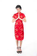 Wall Mural - Full body of Asian Chinese Woman wearing red color traditional Chinese costume Cheongsam with welcome pose