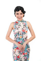 Wall Mural - Portrait of a young asian Chinese female lady model wearing a patterned traditional vintage costume Cheongsam smiling and posing with different poses and gestures 