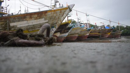 Wall Mural - wooden boats on  shore 