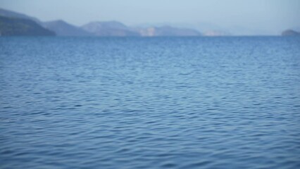 Wall Mural - 4k stock video footage of beautiful peaceful seascape panorama. blue waves of sea water, clear cloud