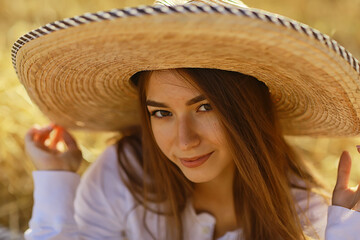 Wall Mural - girl field straw hat summer look, freedom field happiness portrait young woman