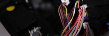 Large Wide Cable With Multicolored Wires And Connectors In Car