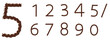 czekoladowe cyfry numery litery alfabet z czekolady brązowy deser
