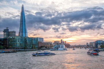 Fototapete - View from Tower Bridge against Thames river with tourist boat in London, England, UK
