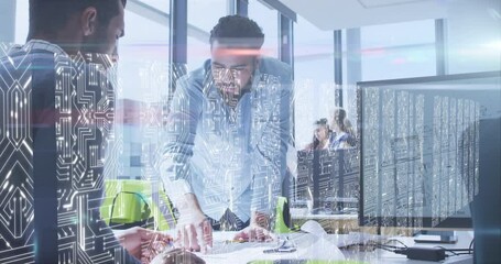 Canvas Print - Screens with microprocessor connections against diverse two male colleagues discussing at office