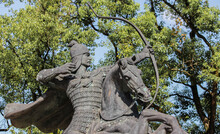 Bronze Statue Of A Chinese Archer Mounted On A Horse Aiming