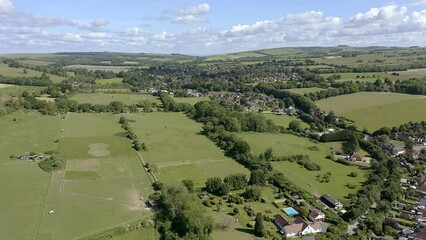 Wall Mural - Aerial video of the Findon valley between the South Downs and the beautiful countryside of West Sussex in Southern England.