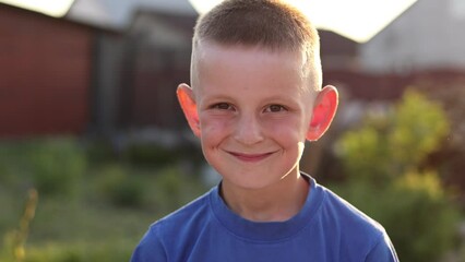 child little boy smiling and looking in camera, caucasian kid, boy with big smile in casual clothes 