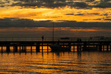 Fototapeta Pomosty - An sunset by the ocean with a jetty, in Melbourne Victoria.