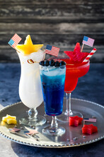 Close Up Of Red, White And Blue Cocktails On A Tray To Celebrate 4th Of July.
