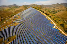 Aerial Photography Of Solar Photovoltaics For Mountain Construction