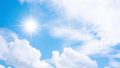 Wall Mural - sun in blue sky with cloud.