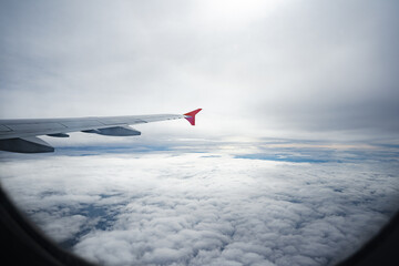 Wall Mural - view through window of aircraft during flight