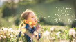 Leinwanddruck Bild - cute little girl blowing dandelions in a sunny flower meadow . Summer seasonal outdoor activities for children. The child smiles and enjoys summer fun
