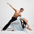 © Alexander Y - young couple of modern ballet dancers posing on clear studio background