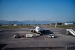 © xpabli - Image of a plane in the airport on a sunny day