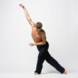 © Alexander Y - modern ballet male dancer posing over white studio background
