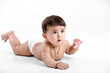 © Niks Ads - Indian baby girl playing on white background.
