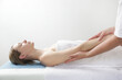 © triocean - Arms massage. Young Caucasian woman enjoing soft shooting partial relax massage experience at spa salon.