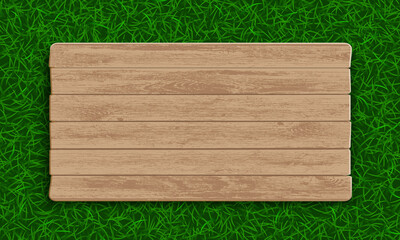 Wall Mural - Wooden plate on green grass background.