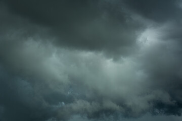 Wall Mural - black clouds before thunder storm closeup