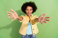 Photo Of Excited Pretty Lady Wear Yellow Denim Jacket Ready Hug You Isolated Green Color Background