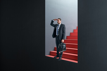 Aufkleber - Attractive thoughtful young european businessman standing and looking into the distance in abstract concrete wall opening with red stairs and mock up place. Door, opportunity and success concept.