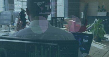 Poster - Animation of data processing over african american businessman talking on smartphone in office