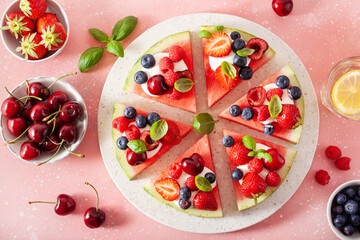 Wall Mural - watermelon pizza slices with yogurt and berries, summer dessert