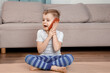 © ibilyk13 - Boy talking on the phone. Cute Boy playing with Mobile Phone. Little child using a smartphone very happy pointing with hand and finger to the side. Lttle boy in a white shirt talking on the phone.