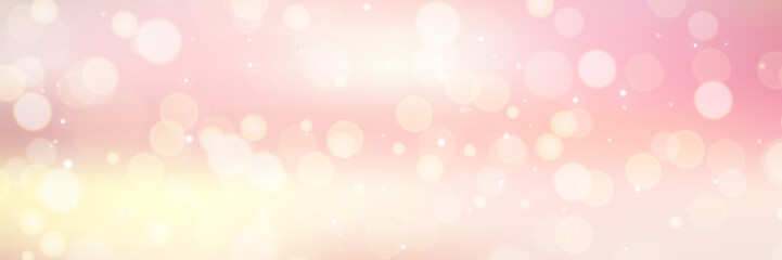 Delicate pink and gold background with bokeh. Pastel spring colors and lights in sunlight.
