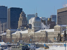 Old Port Of Montreal, With  Bonsecours Market, With Skyscrapers Of Downtown Montreal, Quebec, Canada On A Sunny Winter Day With Clear Blue Sky 