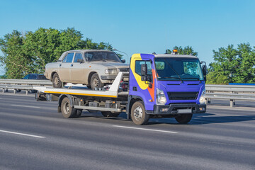 Tow truck for cars transportation.