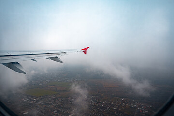 Wall Mural - view through window of aircraft during flight