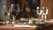 © Hihitetlin - Served restaurant table with wine drinks and food